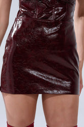 IM YOUR WEAKNESS FAUX LEATHER MINI SKIRT