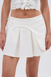 ALWAYS GETS BETTER PLEATED MINI SKIRT