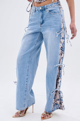 SEASONAL AWAKENING BROCADE PATCH DENIM JEANS