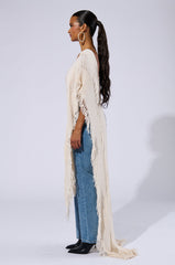 GOOD VIBES DISTRESSED PONCHO IN CREAM