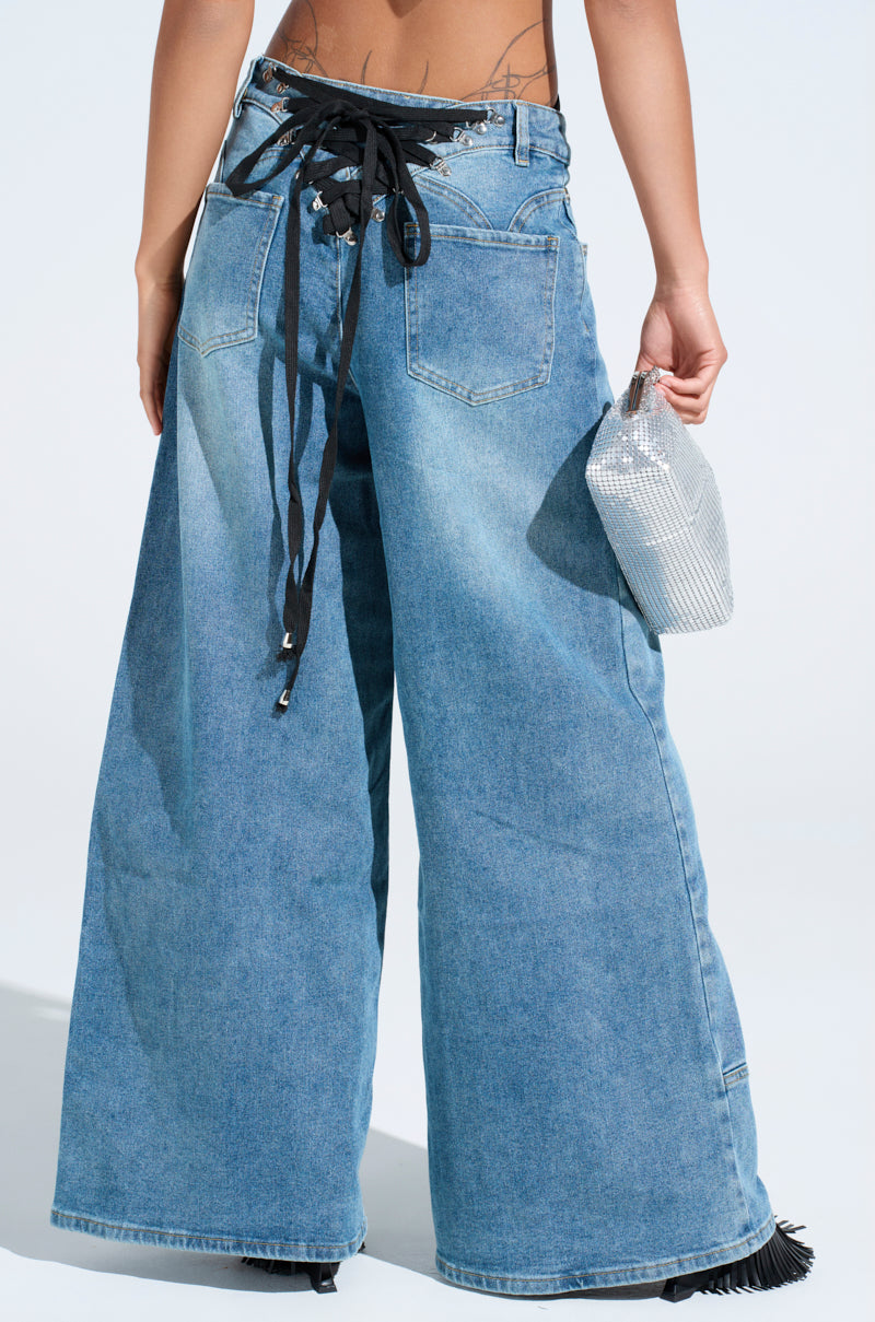 ALIVE AND WELL DENIM PANT WITH LACE UP AT HEM