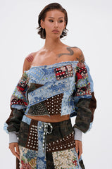 CALL ME CRAZY PATCHWORK OFF THE SHOULDER SWEATSHIRT