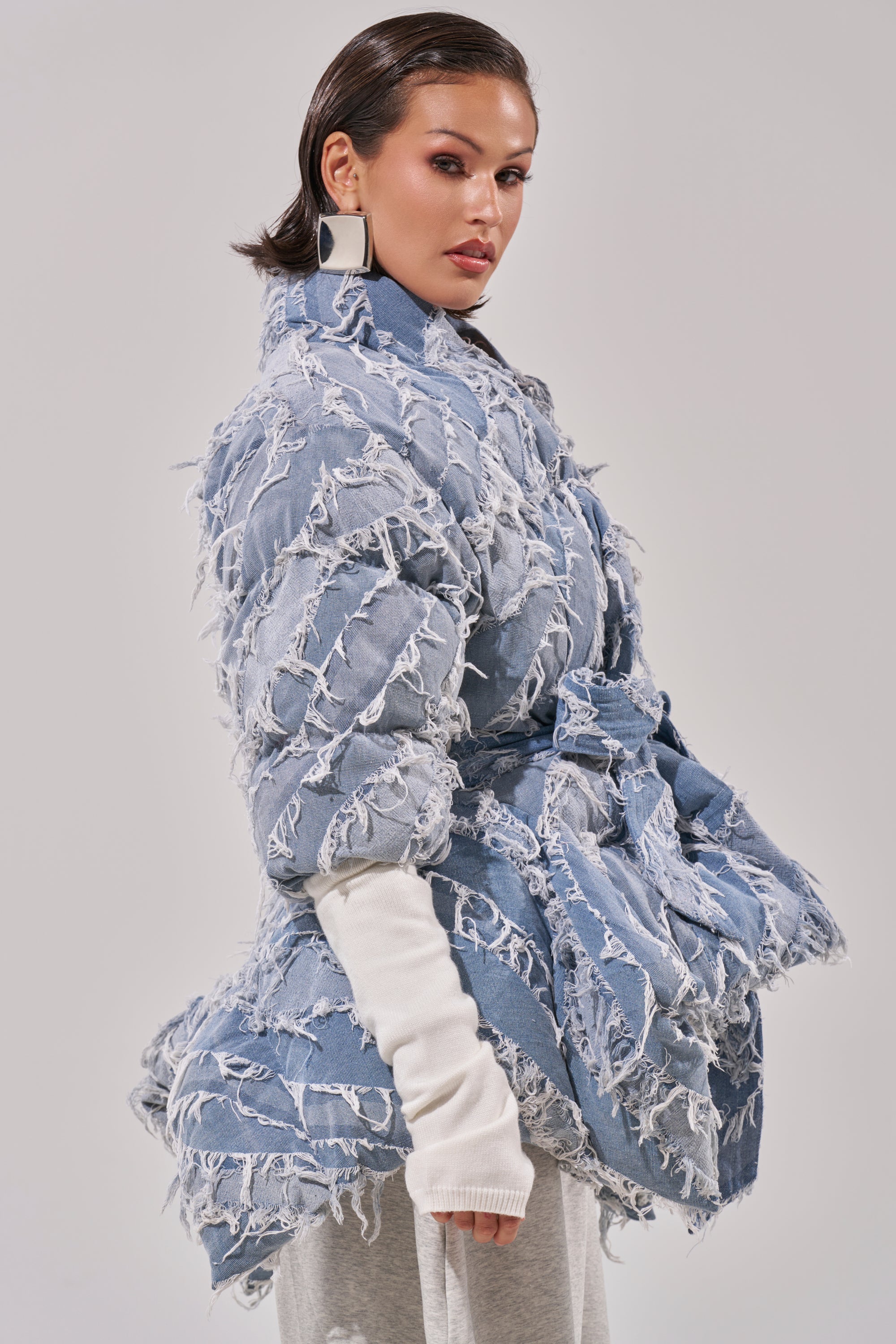 RIB SLEEVE PEPLUM PUFFER IN DENIM