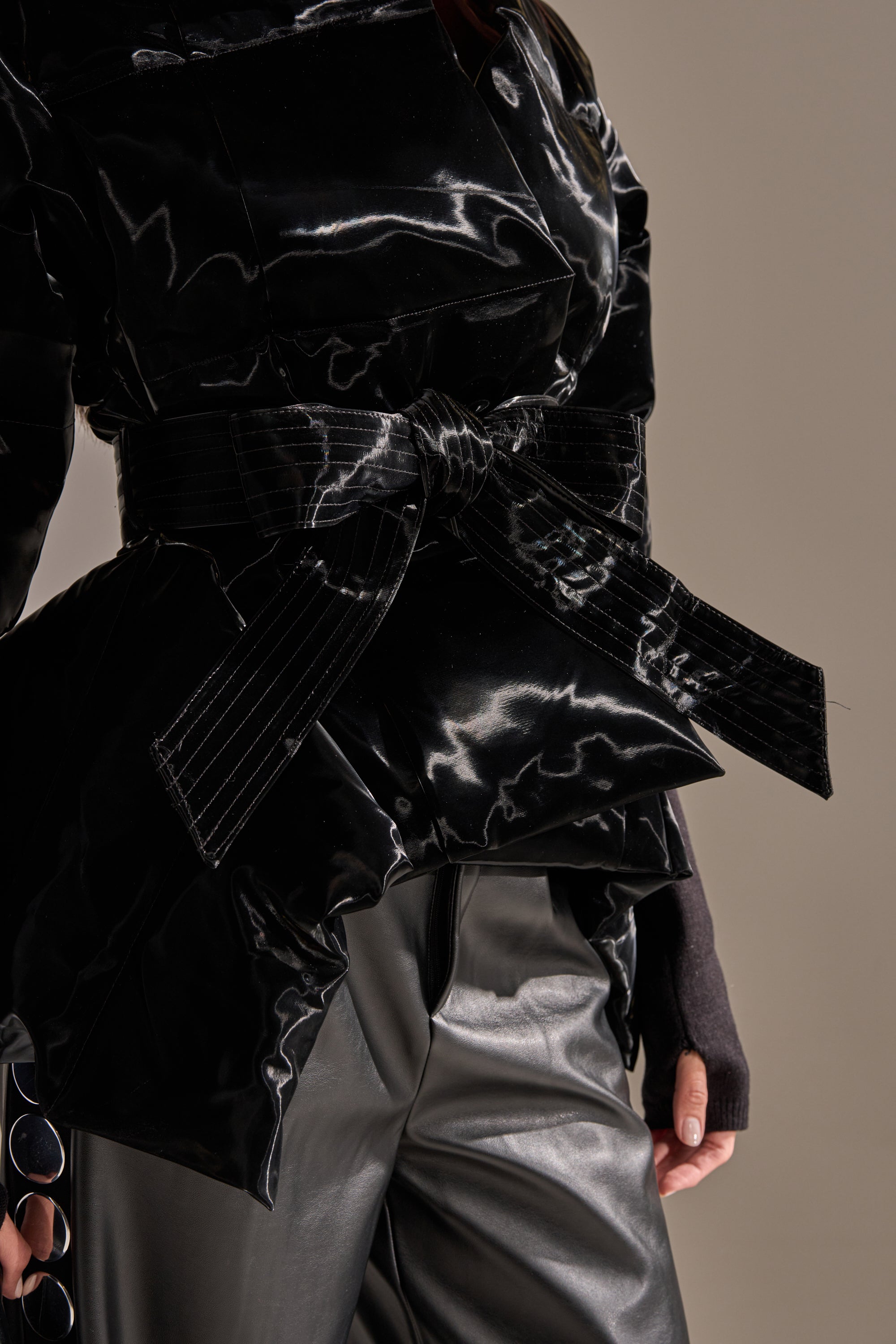 RIB SLEEVE PEPLUM PUFFER IN LIQUID VELVET