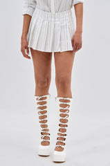 ONTO THE NEXT EMBELLISHED PLEATED MINI SKIRT IN WHITE