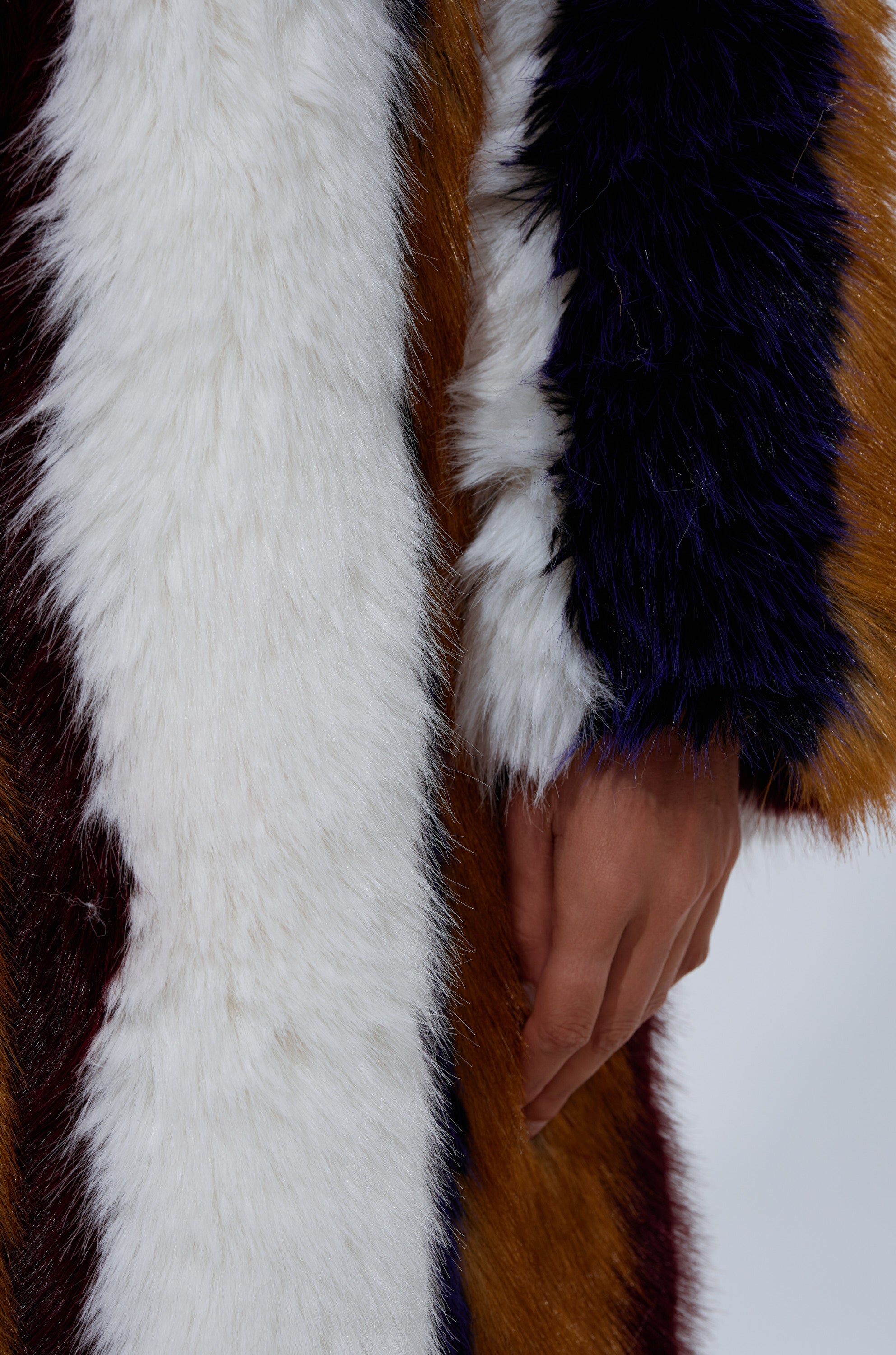 ALAIA STRIPED FAUX FUR