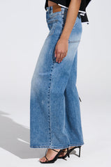 REVERSE REVERSE MEDIUM WASH JEANS