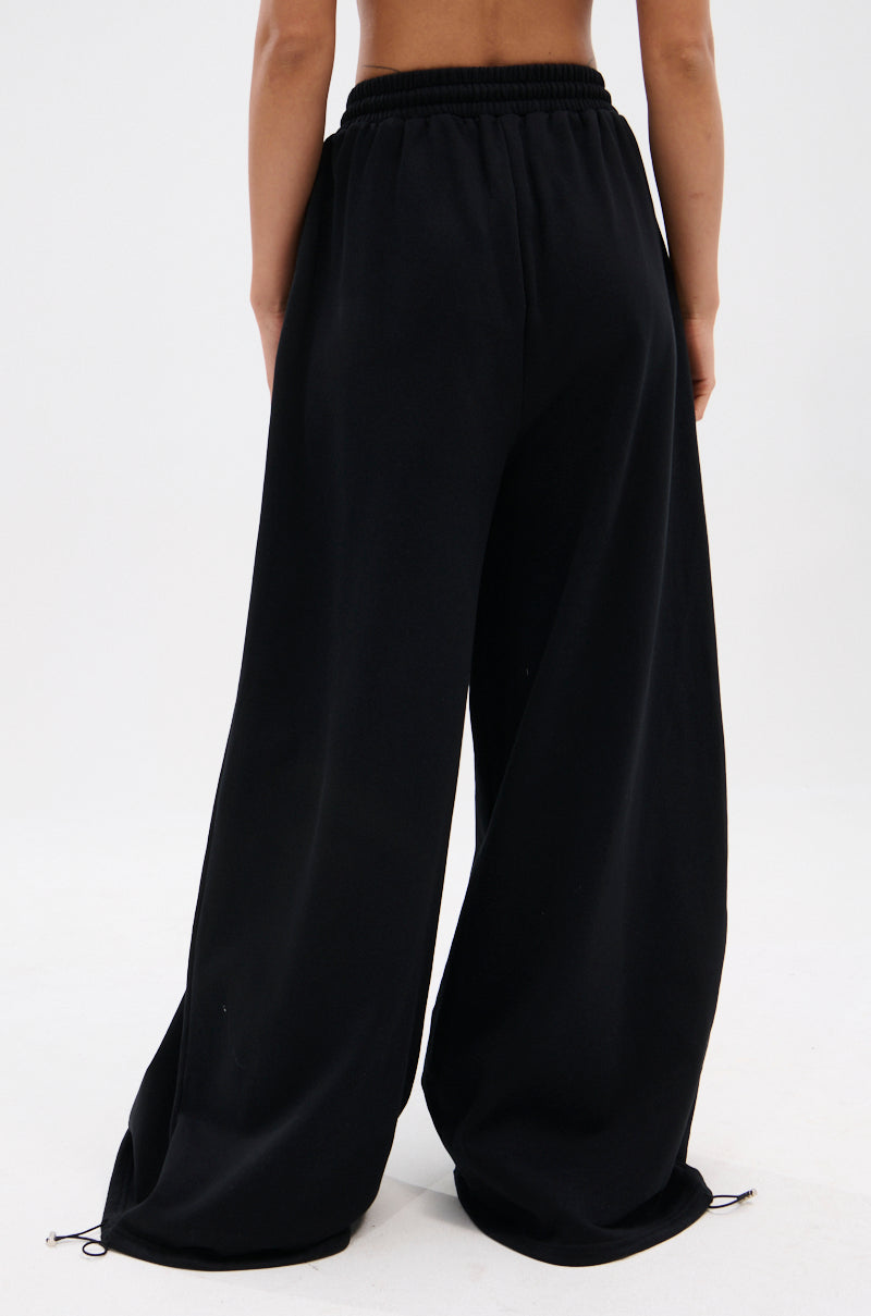 THROUGH THE NIGHT WIDE LEG SWEATPANT WITH HOLES