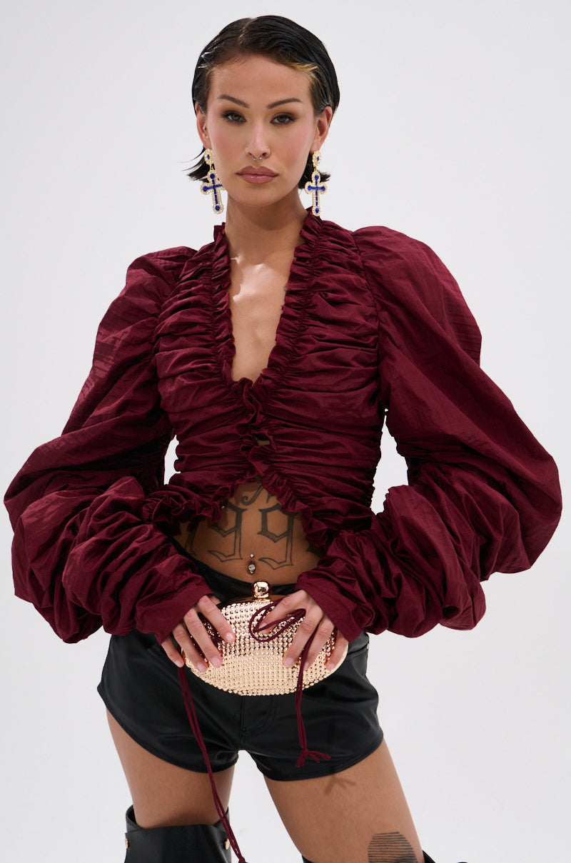 IN IT TO WIN IT RUCHED BLOUSE IN BURGUNDY