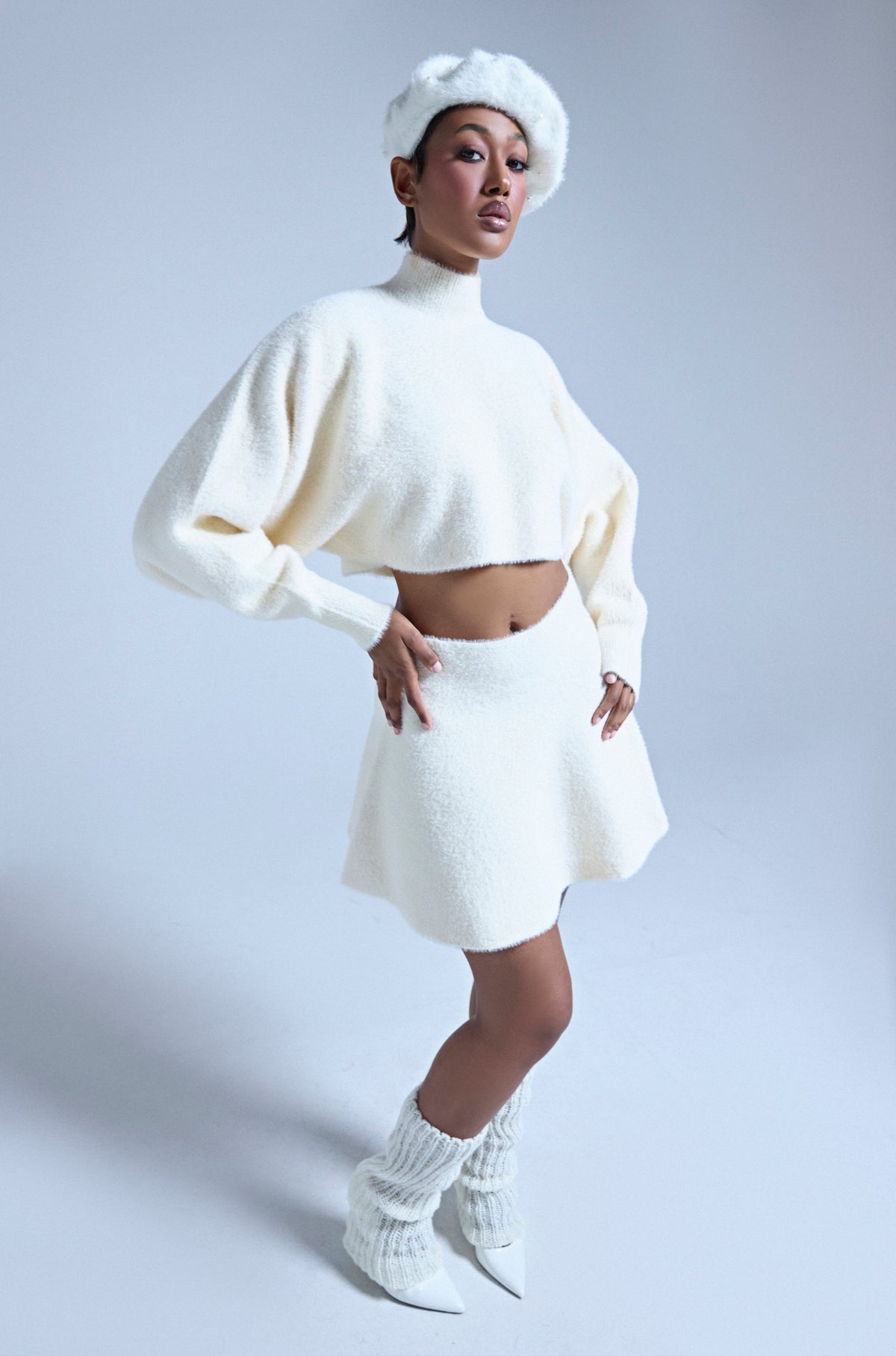 CUDDLE UP FUZZY MINI SKIRT IN IVORY