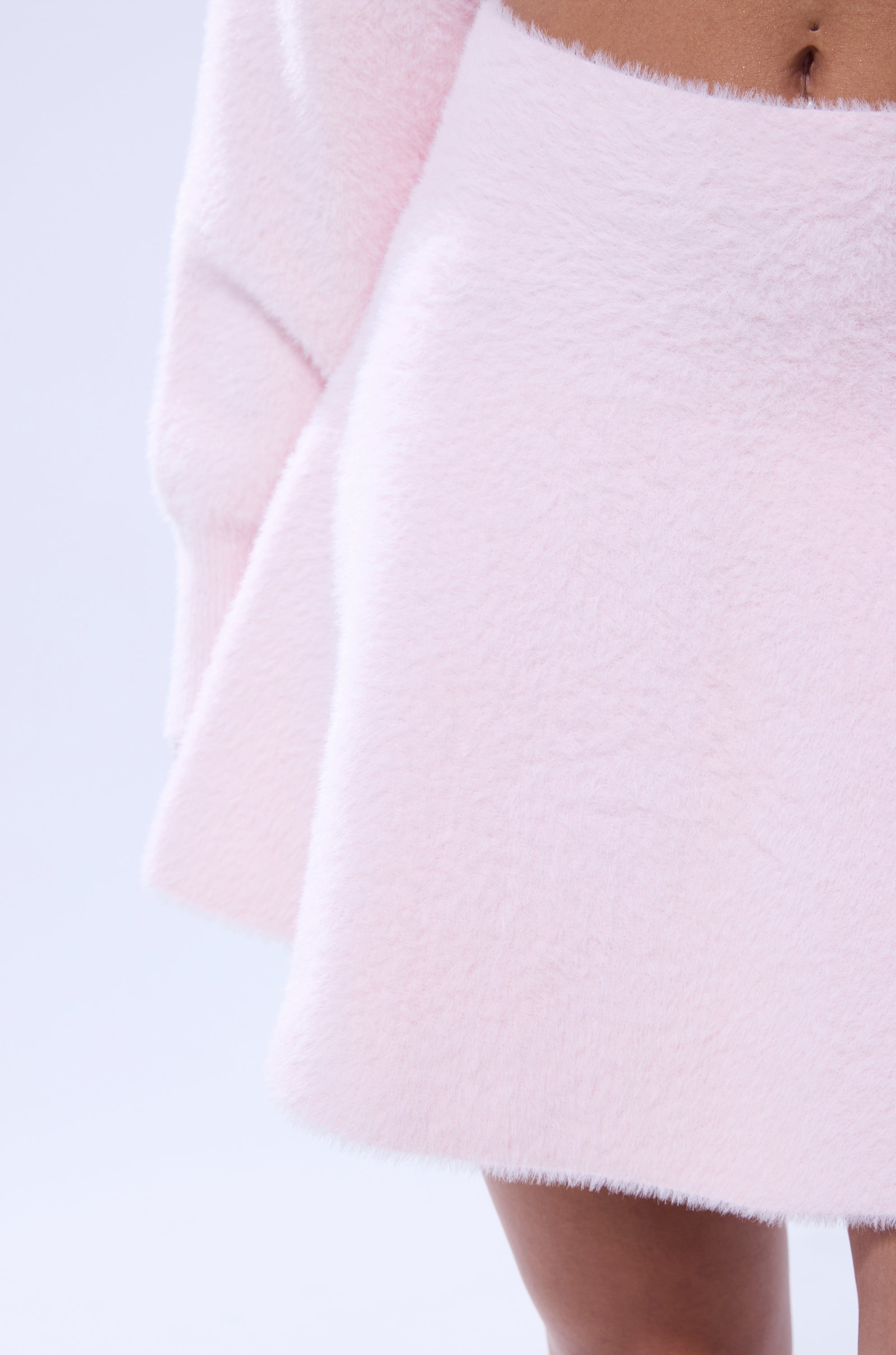 CUDDLE UP FUZZY MINI SKIRT IN PINK