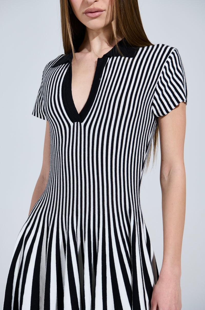 ALINA PLEATED KNIT FIT AND FLARE MINI DRESS IN BLACK AND WHITE