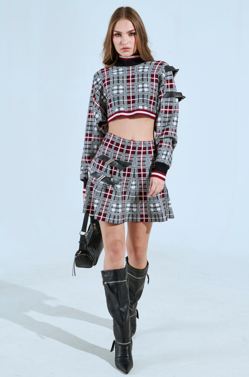 ALL EYES ON ME BUCKLE DETAIL KNIT MINI SKIRT IN RED