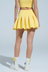 PAXTON SUPERLUXE PLEATED MINI SKIRT IN YELLOW