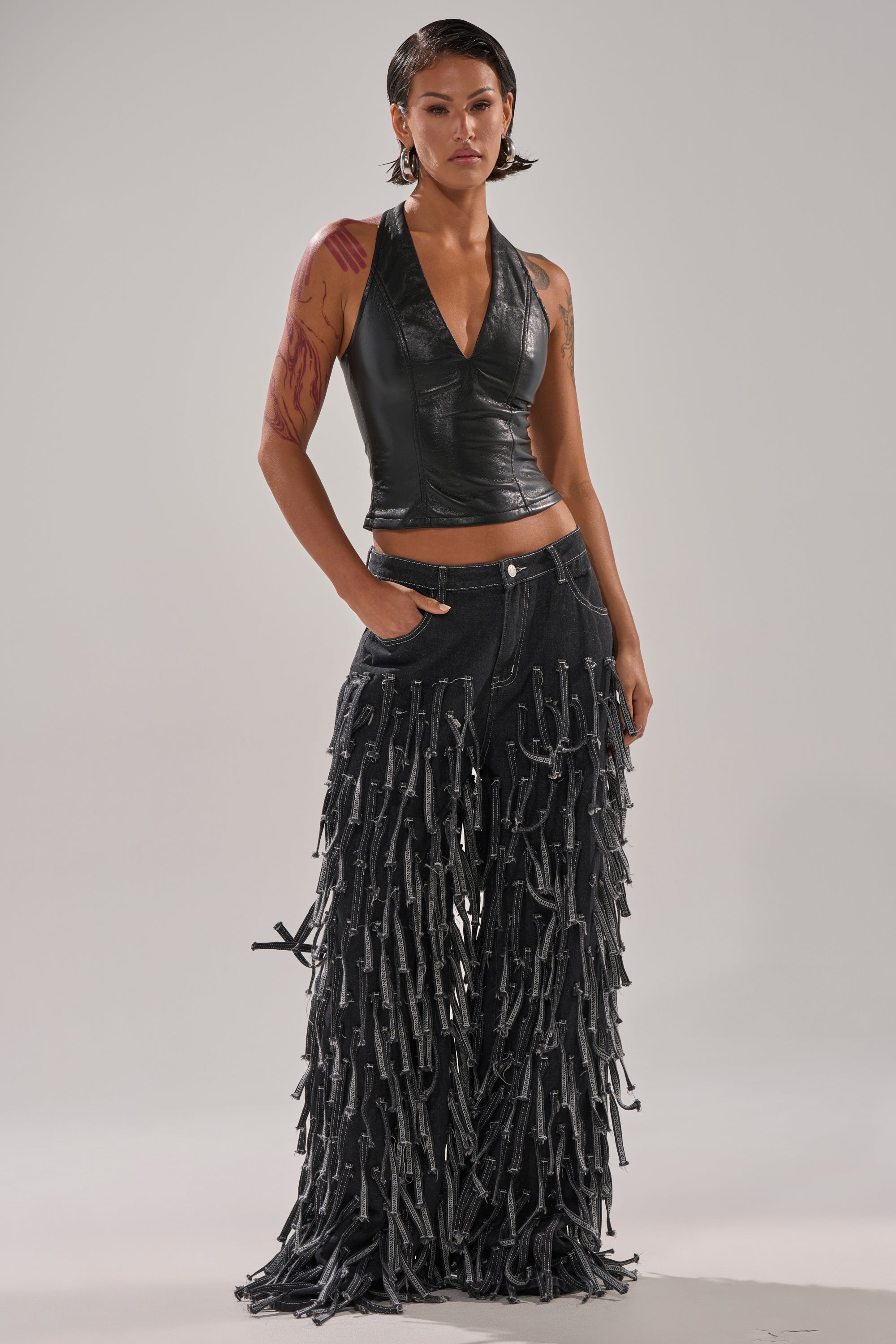 WITHOUT A DOUBT FAUX LEATHER HALTER NECK CORSET IN BLACK