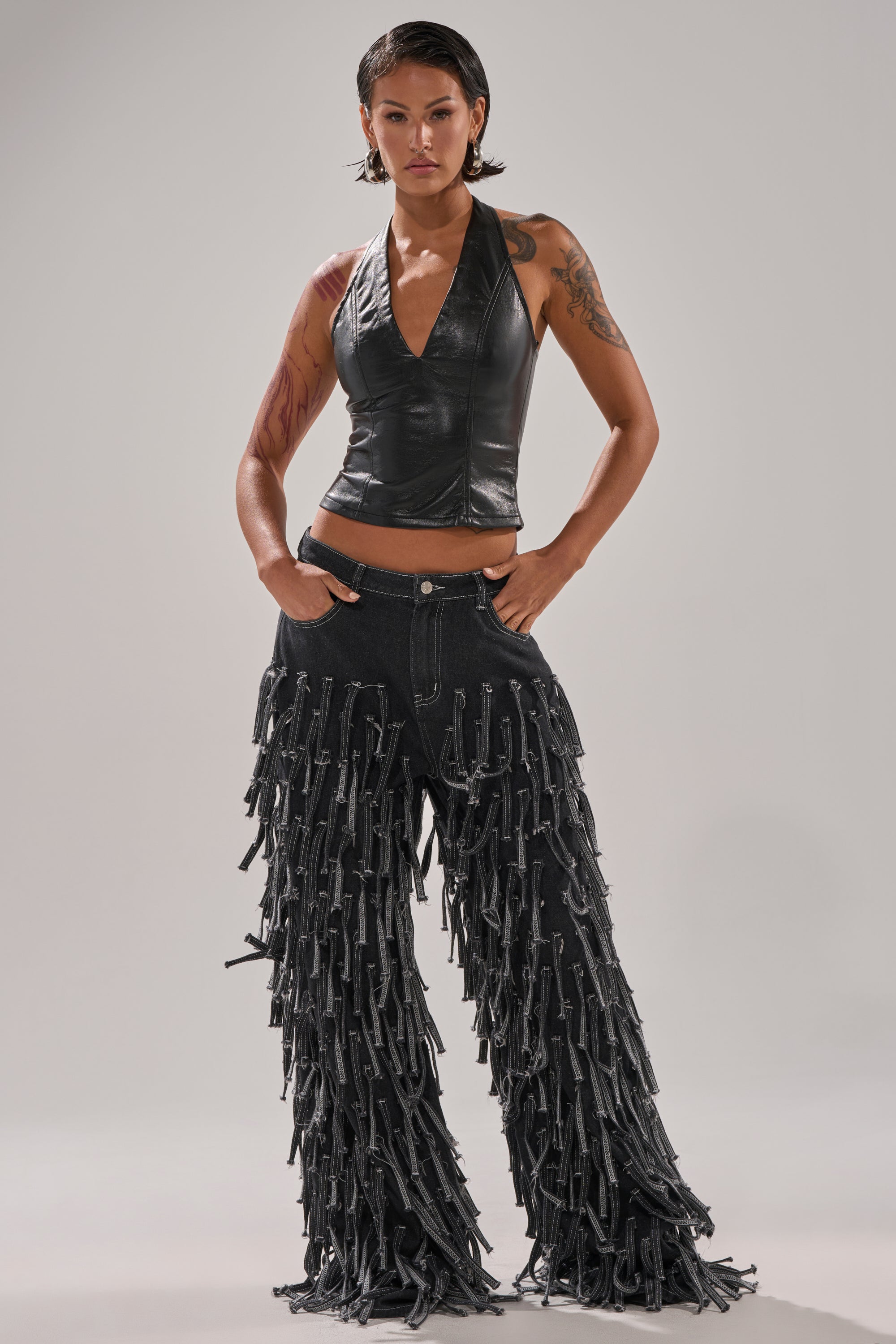 WITHOUT A DOUBT FAUX LEATHER HALTER NECK CORSET IN BLACK