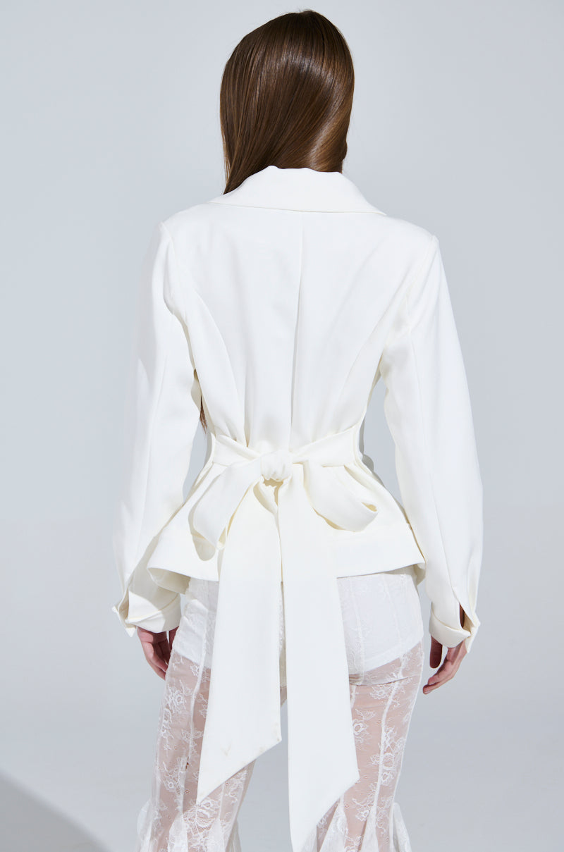 WRAPPED IN A BOW BLAZER IN WHITE