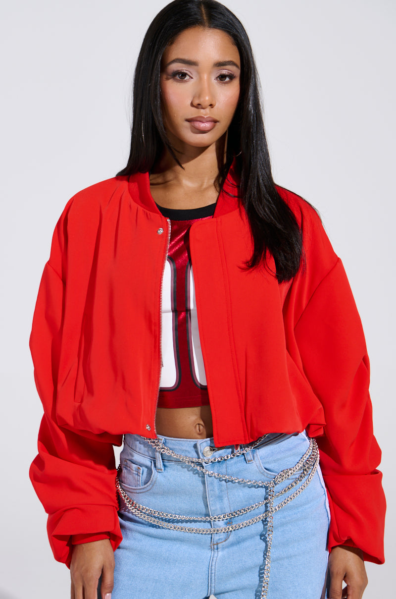 TREY RUCHED SLEEVE BOMBER IN RED