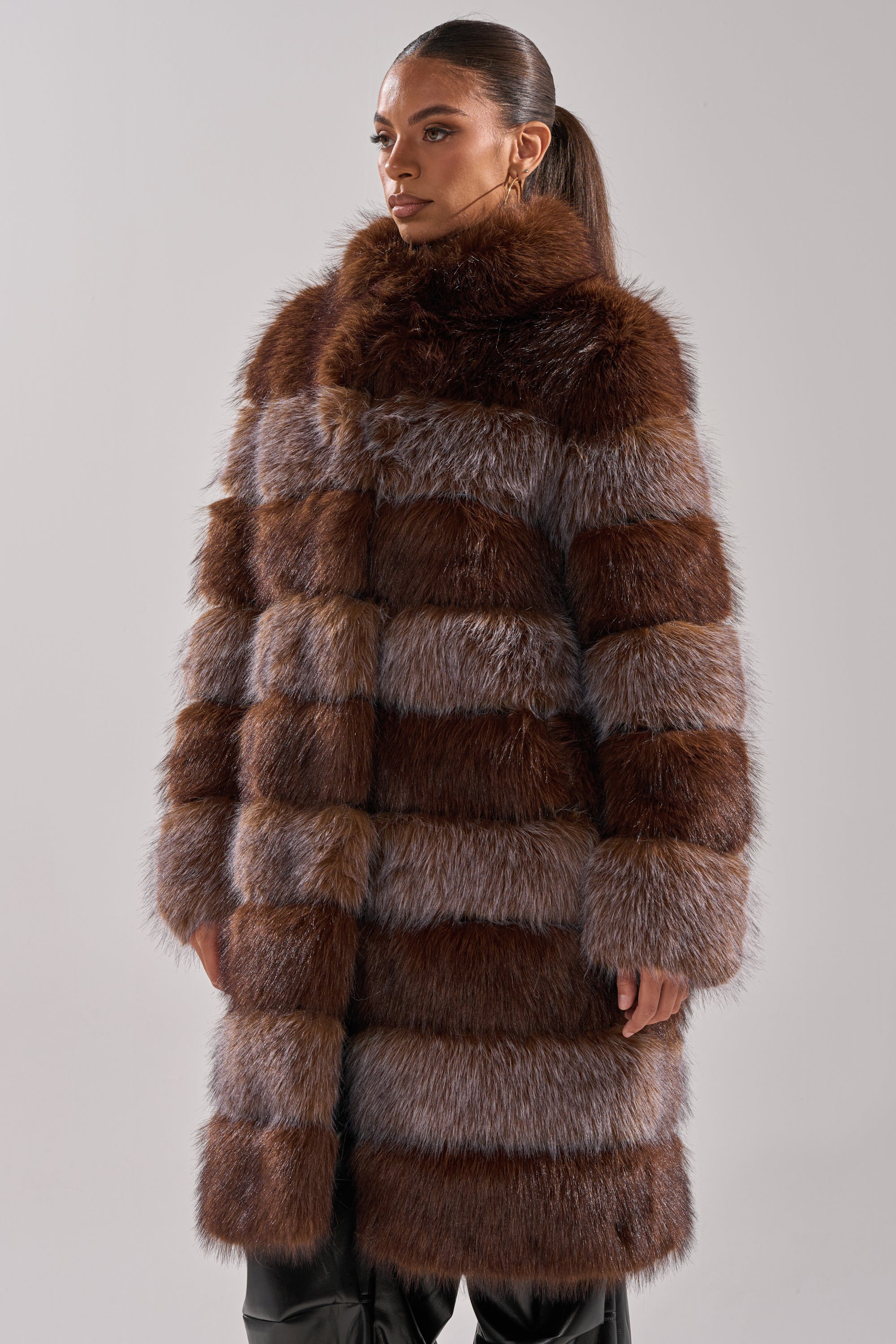 LITTLE BIT OF SPICE PANELED FAUX FUR COAT