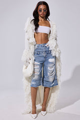 BURRR IT'S COLD OUTSIDE FRINGE OVERSIZED SWEATER IN IVORY