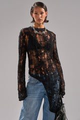 ASYMMETRICAL KNIT SWEATER