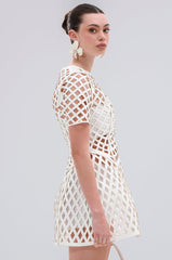 SHE'S DIFFERENT CUT OUT FAUX LEATHER MINI DRESS IN WHITE