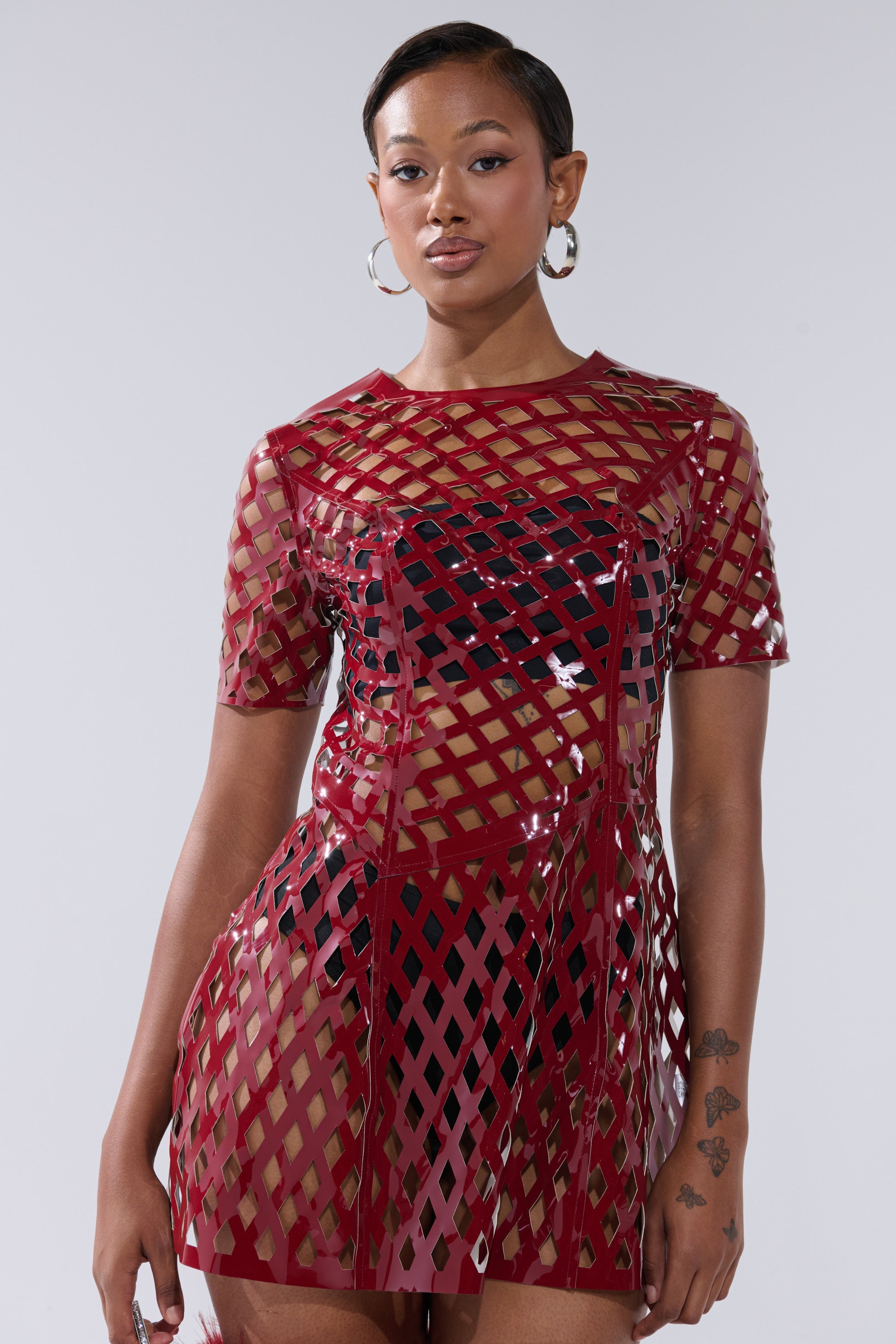 SHE'S DIFFERENT CUT OUT FAUX LEATHER MINI DRESS IN BURGUNDY