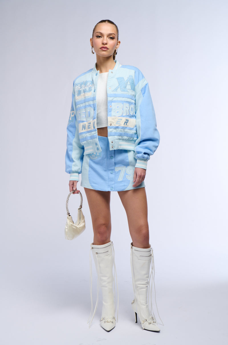 BRUISED NEVER BROKEN MINI SKIRT