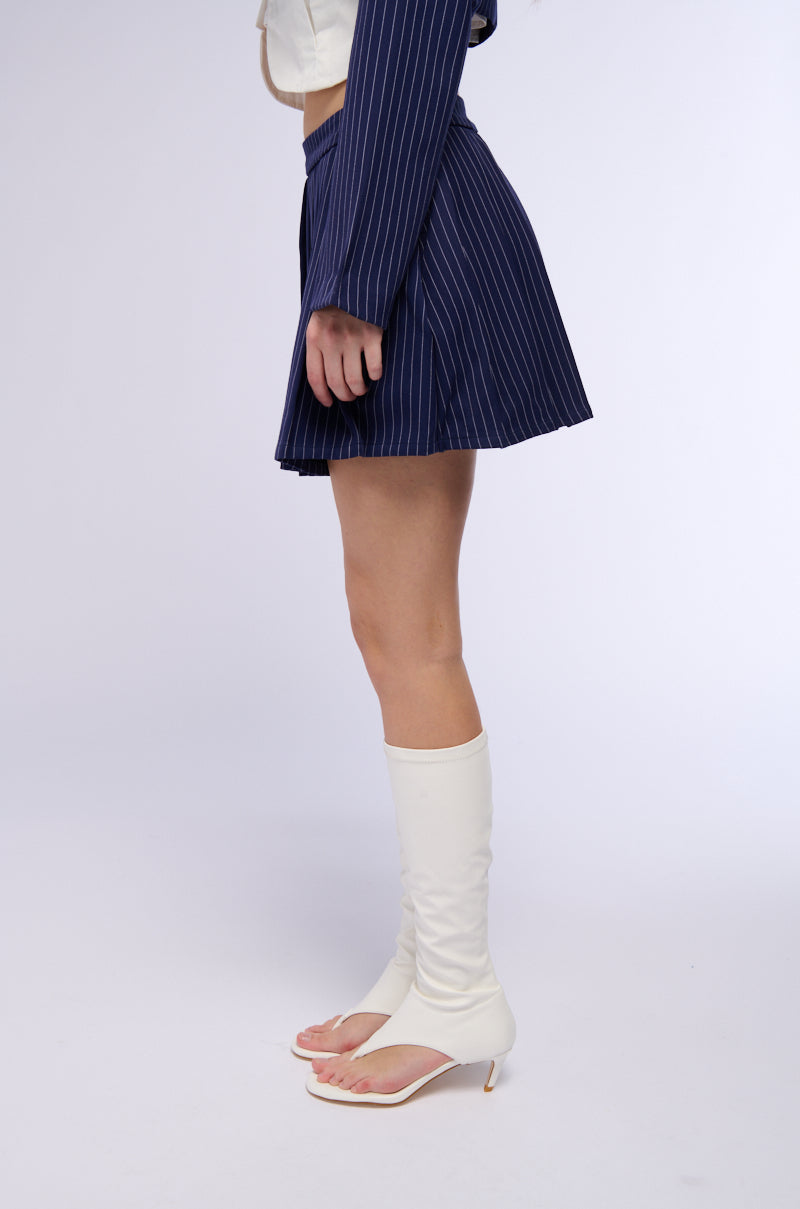 WHATS THE TEA PINSTRIPE PLEATED MINI SKIRT IN NAVY