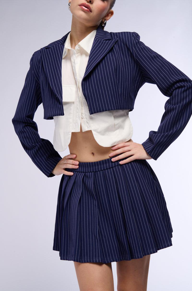 WHATS THE TEA PINSTRIPE PLEATED MINI SKIRT IN NAVY