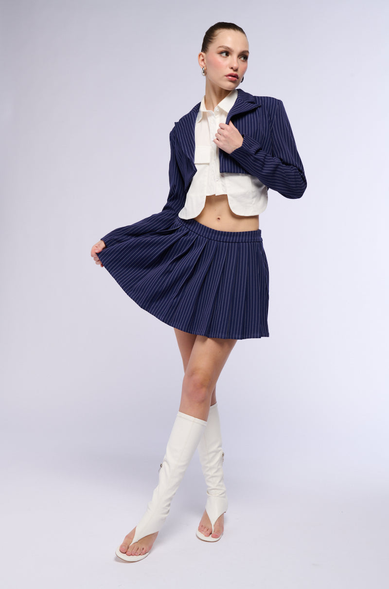 WHATS THE TEA PINSTRIPE PLEATED MINI SKIRT IN NAVY