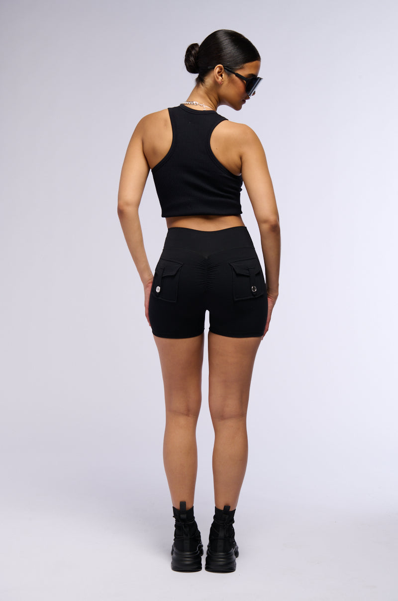 YOGA CROSS FRONT RUCHED BIKER SHORT IN BLACK