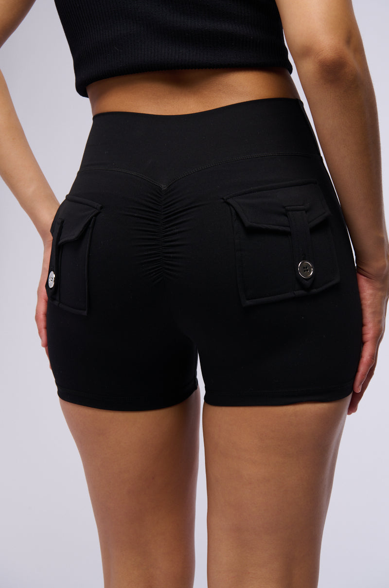 YOGA CROSS FRONT RUCHED BIKER SHORT IN BLACK
